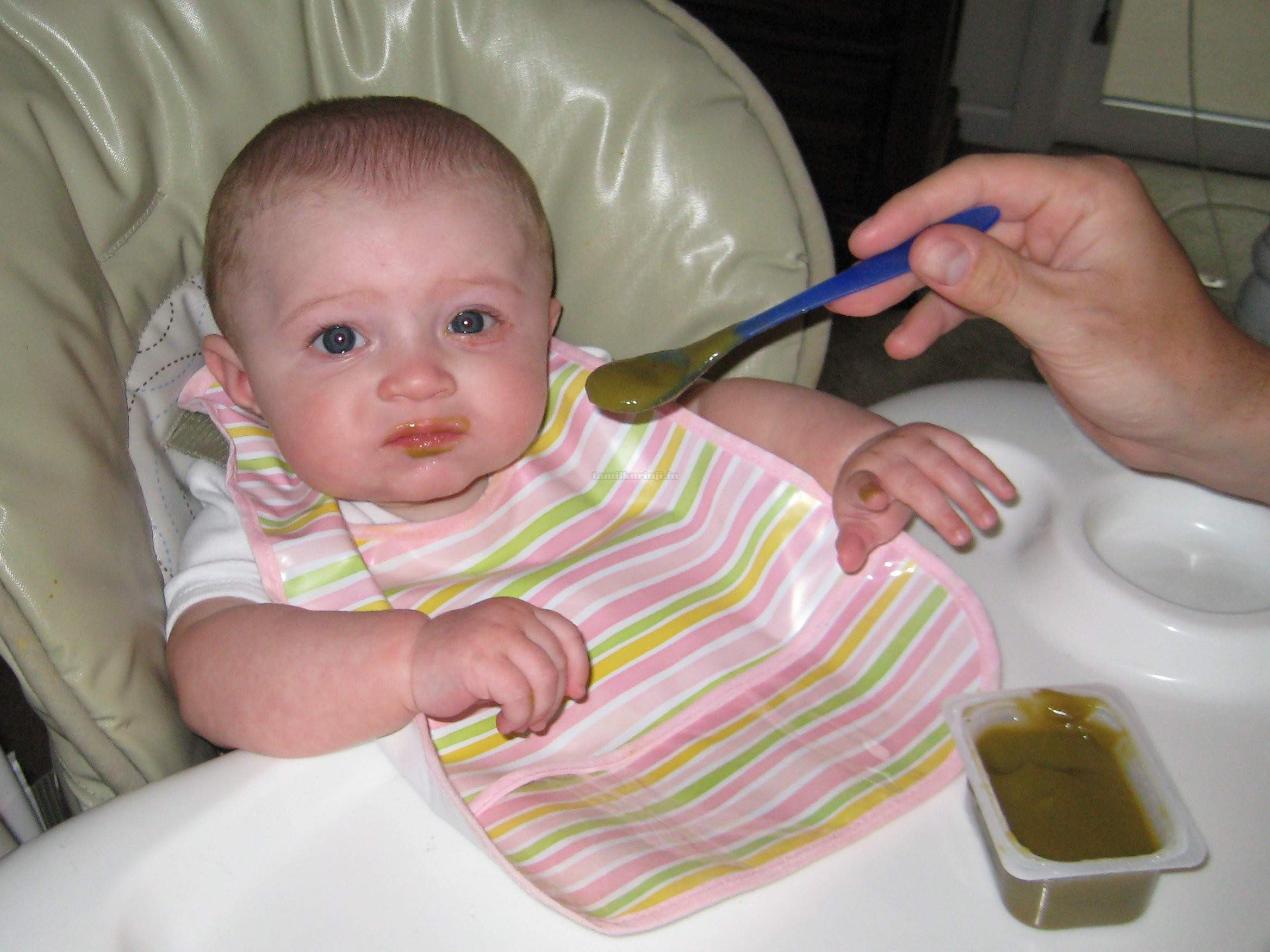 eating baby food