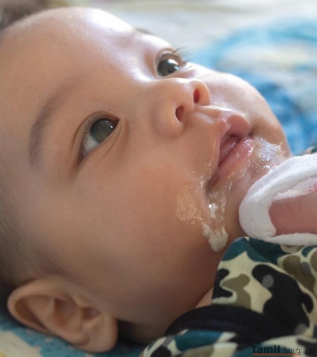 Baby Spitting Up Mucus Is It Normal Causes and When To Worry 624x702 1