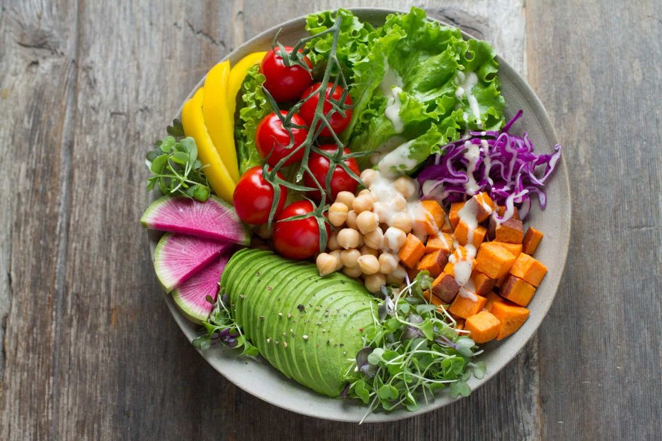 642c5de2f6aa2bd4c9abbe86 6406876a4676d1734a14a9a3 Bowl of vegetables and fruits for a vegetarian diet vegetarian weight loss plan